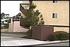Apt A Outside Driveway to Carport and Trash.jpg