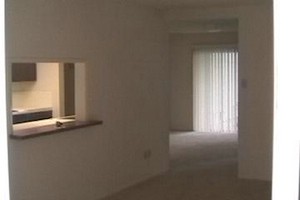 Apt 115 Kitchen and Den from Living room .jpg