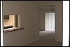 Apt 115 Kitchen and Den from Living room .jpg