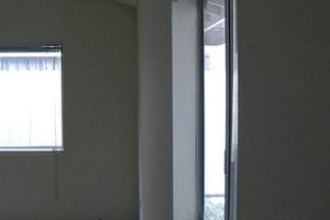 Apt 6 Dining room from kitchen and sliding door to backyard.jpg